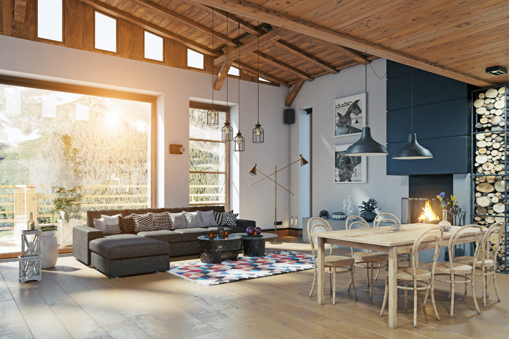 Beautifully staged cabin-style living and dining area with natural lighting, captured using STR photography to enhance vacation rental appeal.